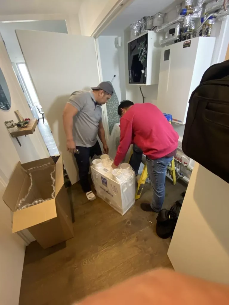 Our technician's unboxing a new ventilation system, ready for commission!